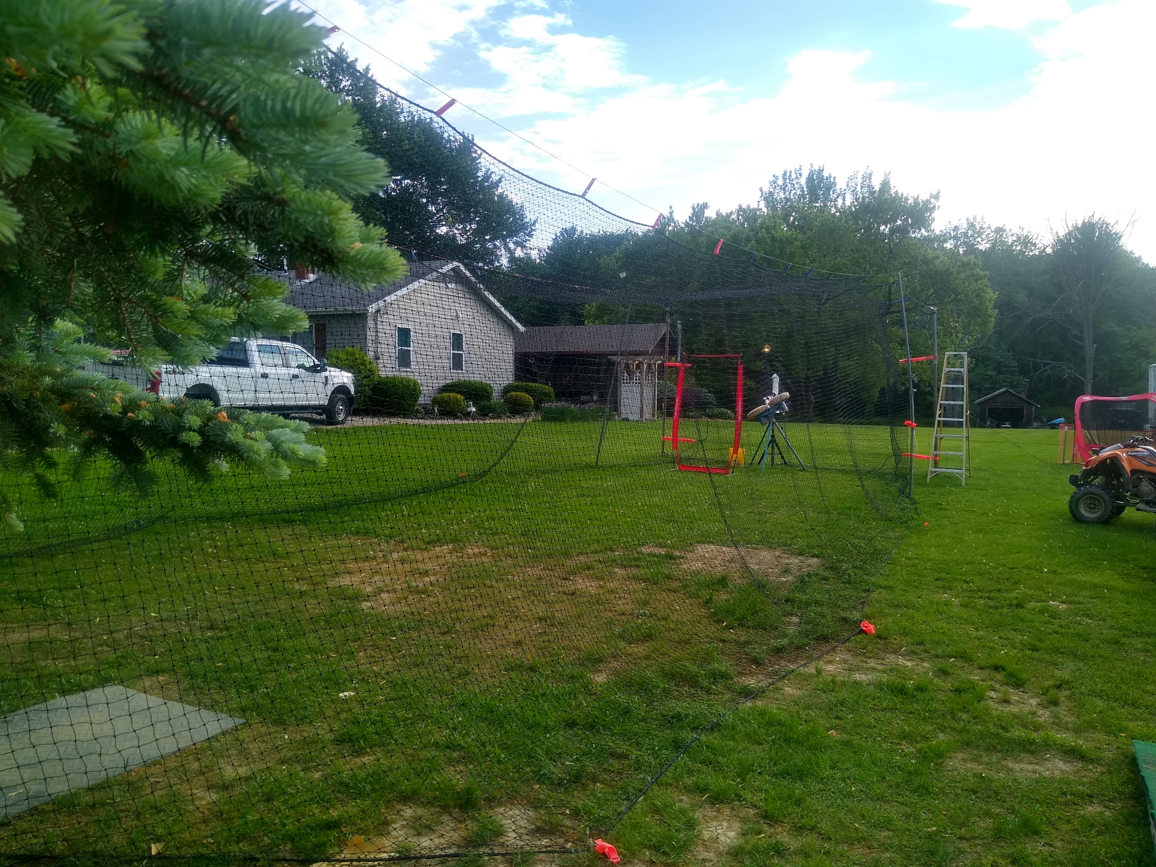 Outdoor Batting Cage in Geneva, OH — Pitching Machine & Baseball - photo 4