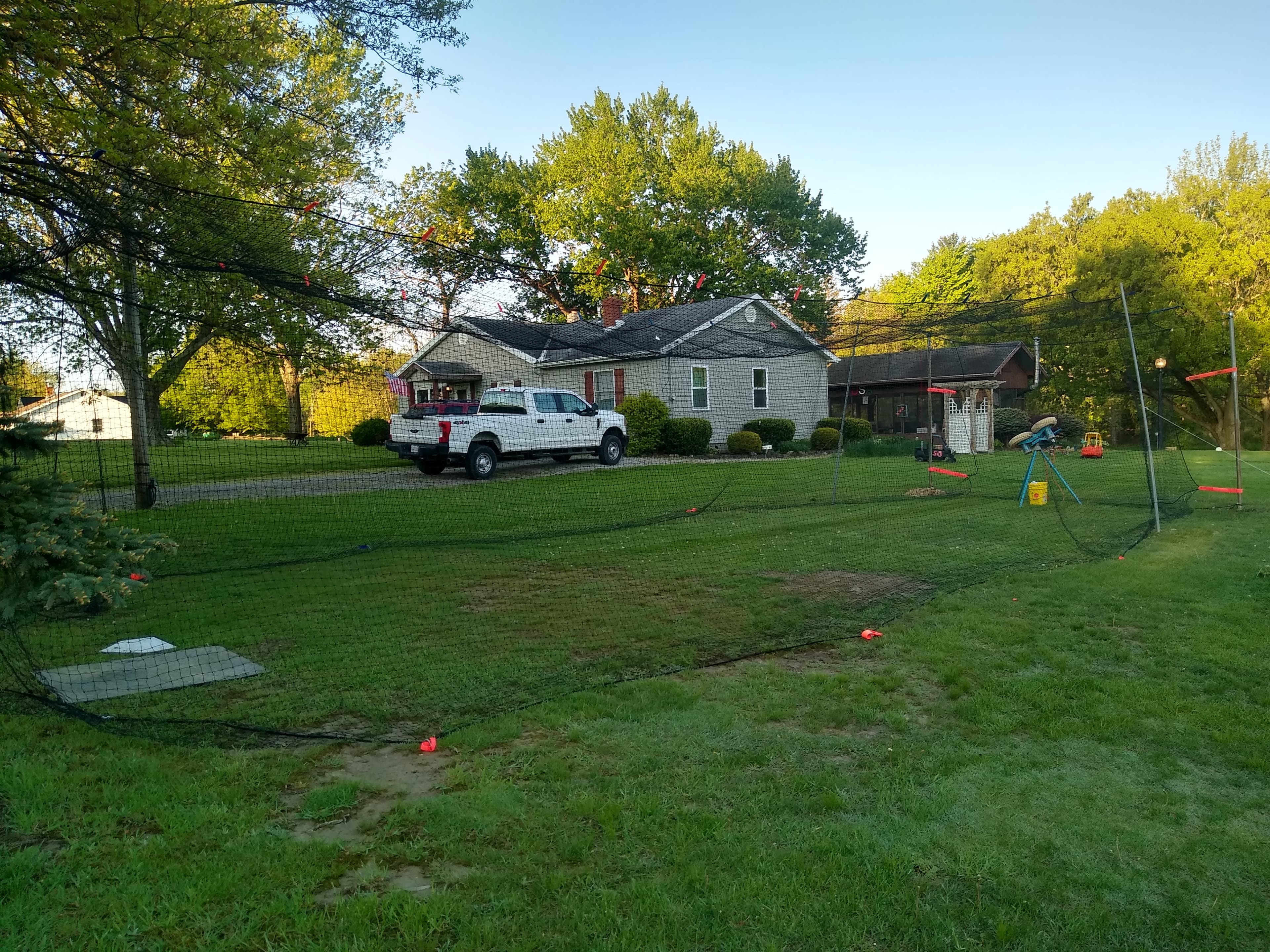 Outdoor Batting Cage in Geneva, OH — Pitching Machine & Baseball - photo 5