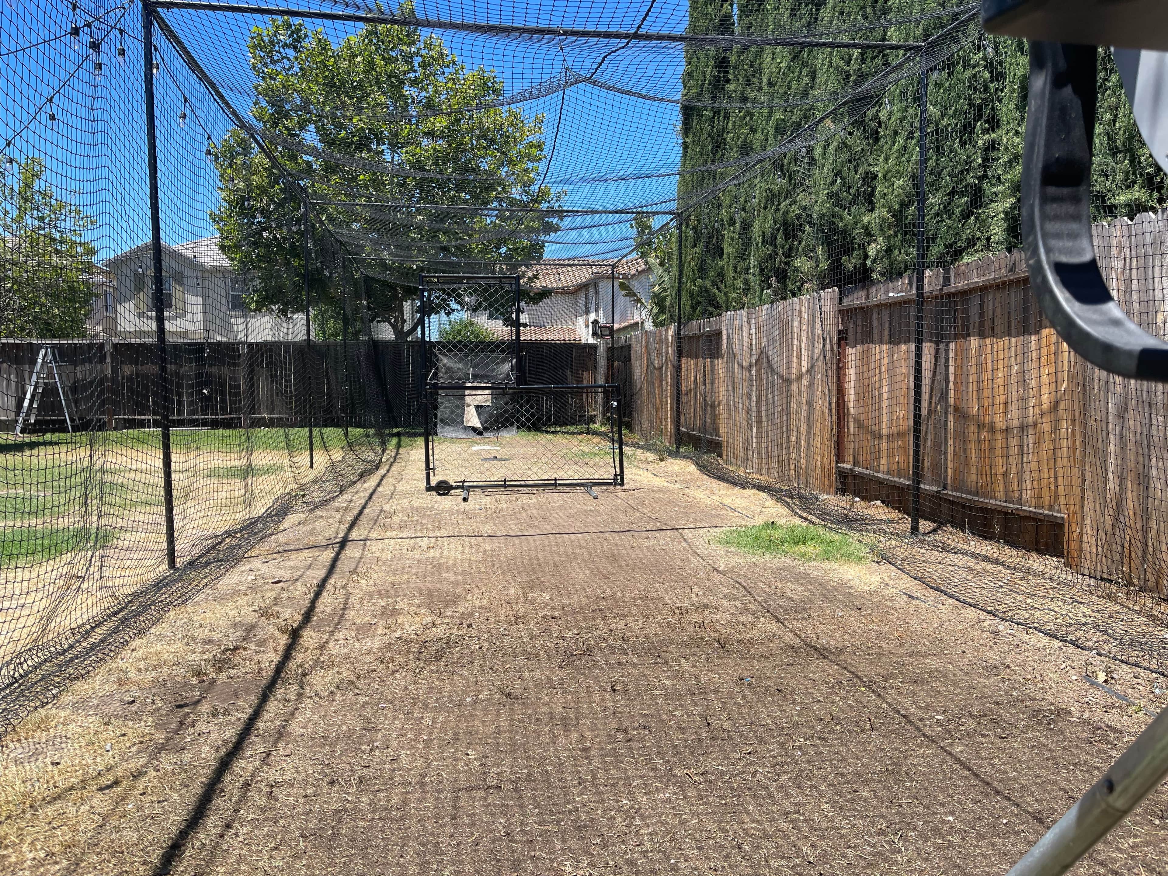Backyard Batting Cage in Elk Grove, CA — Pitching Machine & Lighted photo 2