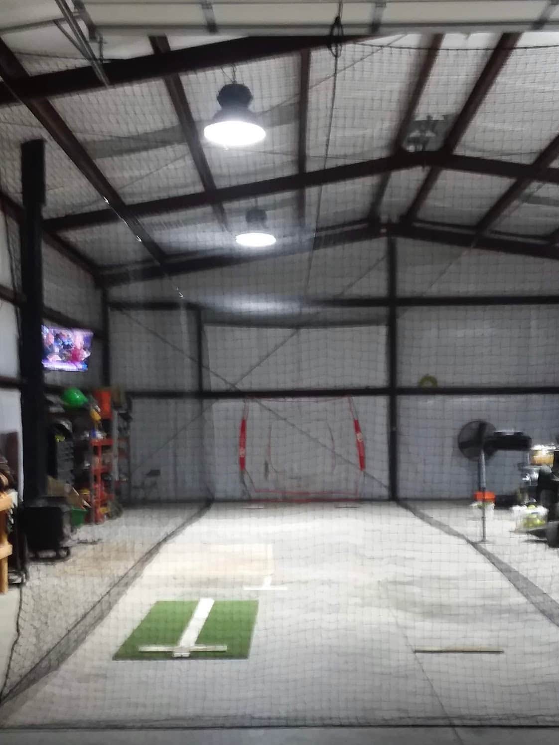 Indoor batting cage with pitching machine in Rio Oso, CA