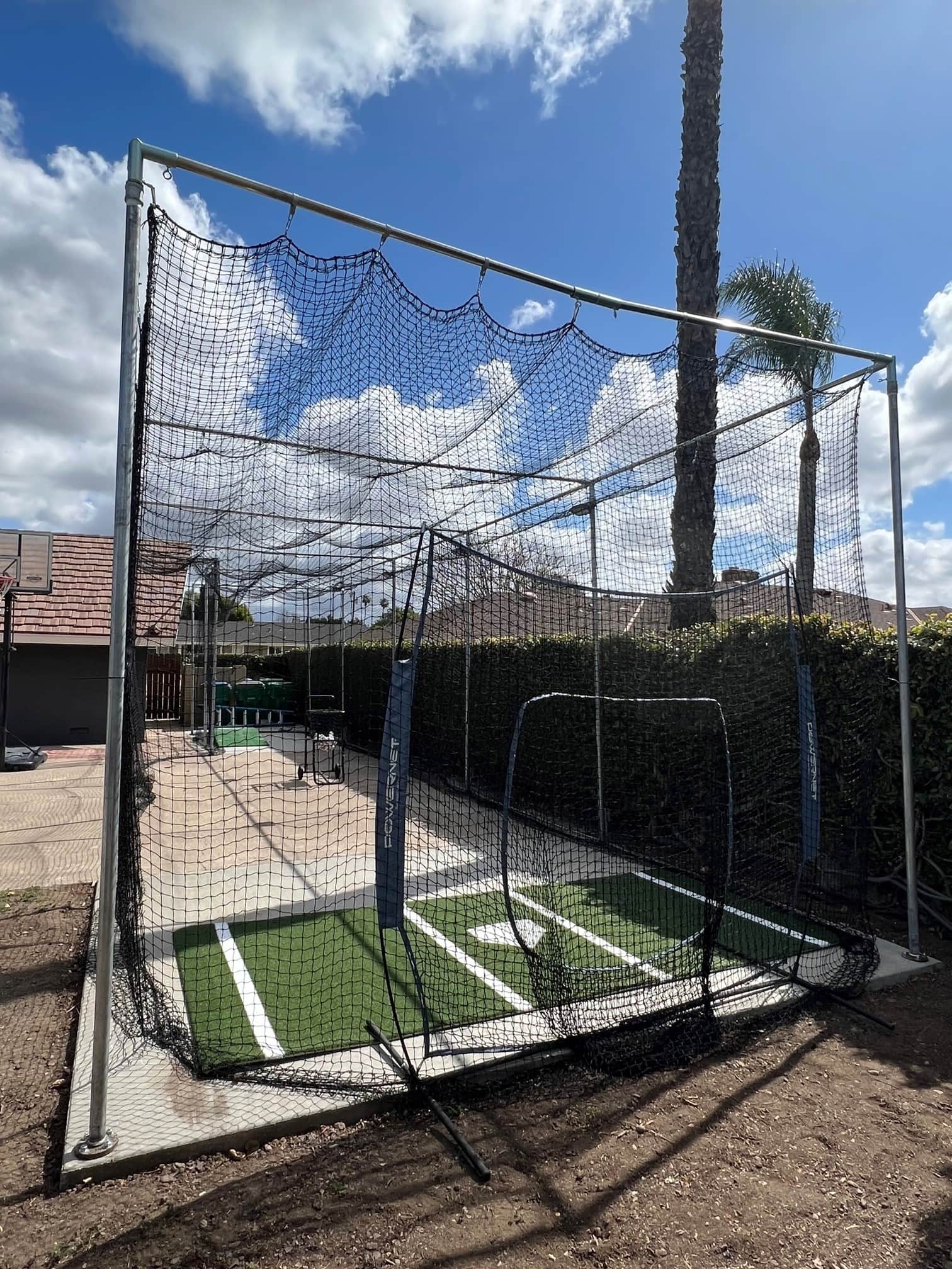 Batting cage w/pitching machine in Santa Ana, CA