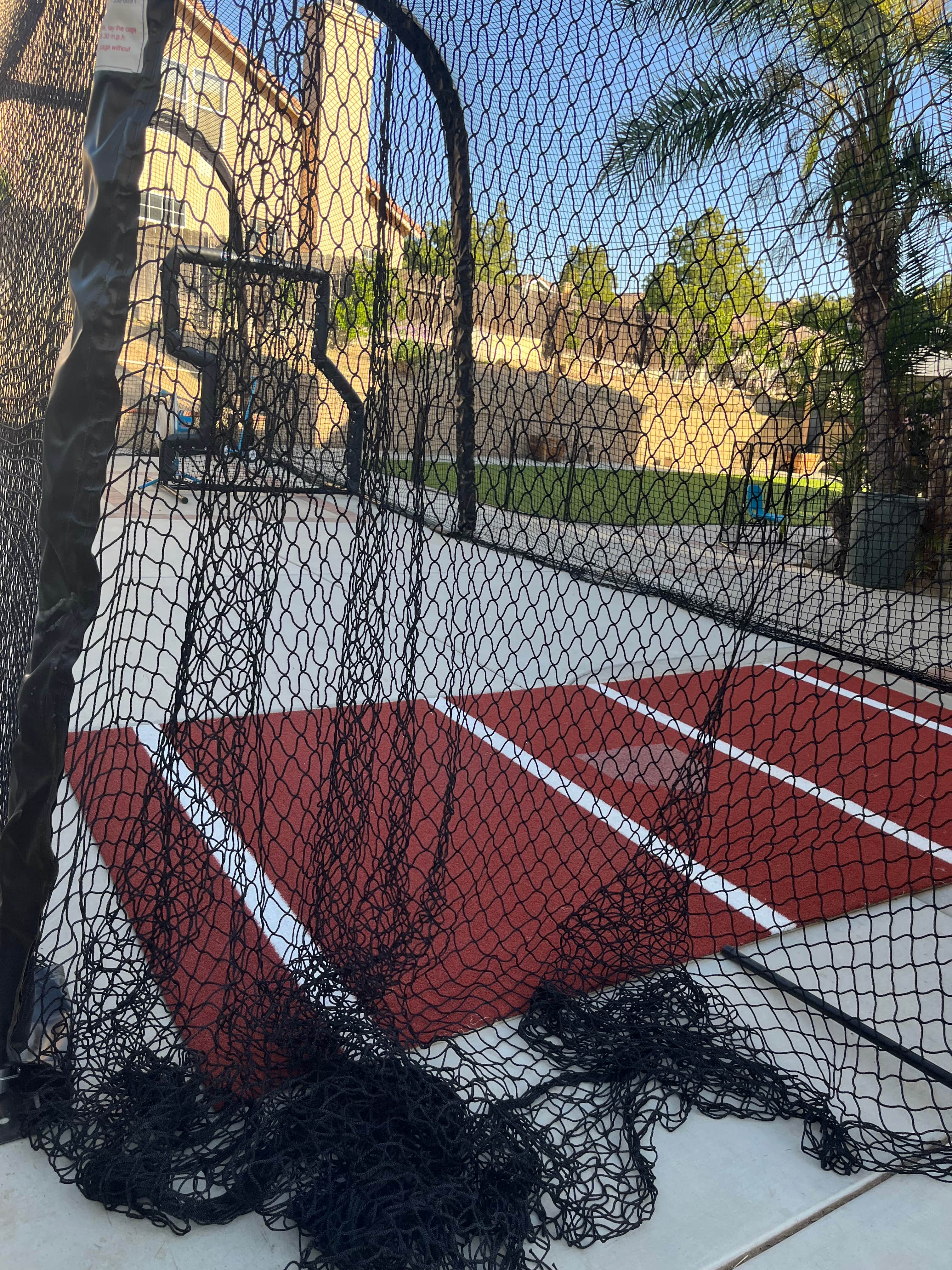 Outdoor Batting Cage in Moreno Valley, CA — Pitching Machine & Baseball