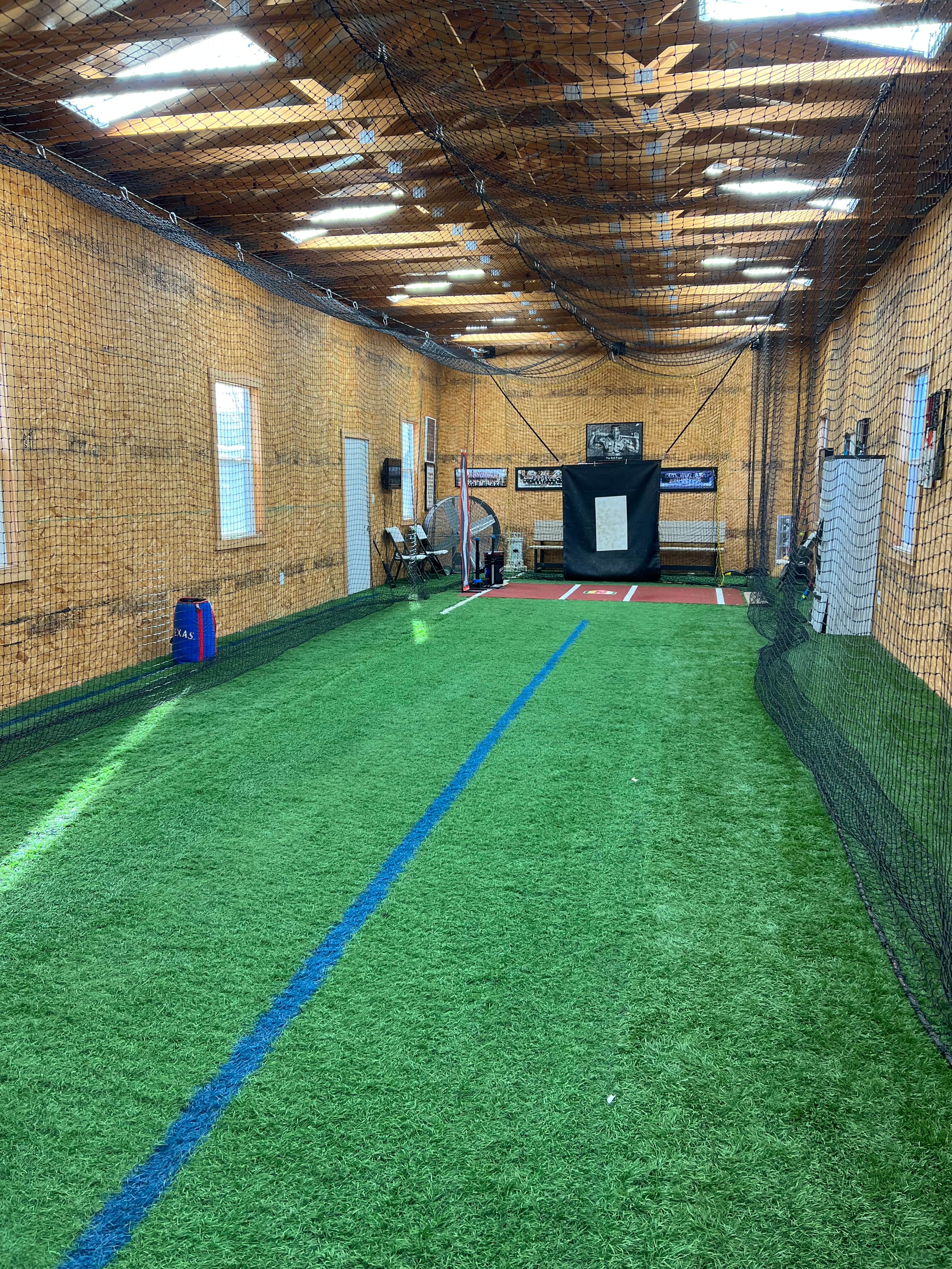 Indoor batting cage with turf in Grand Prairie, TX